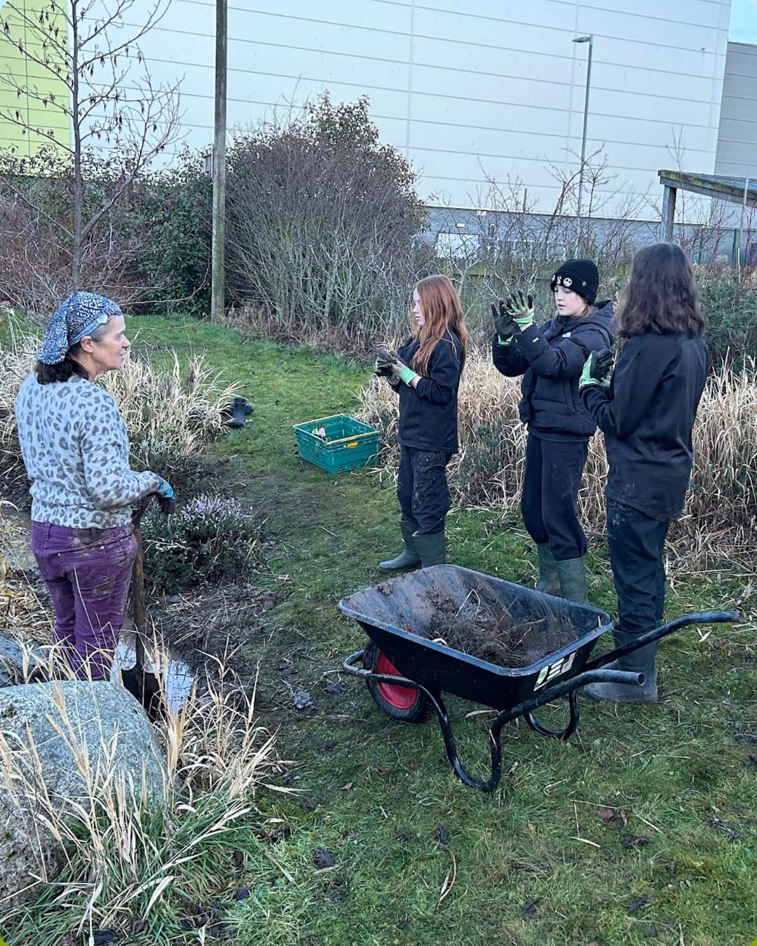 Midlothian Wildflowers volunteers carrying out practical habitat work in a community greenspace